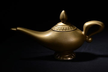 Magic lamp isolated on black