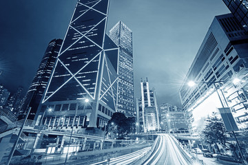 traffic with blur light through city at night