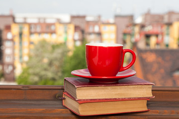 Books and a coffee cup