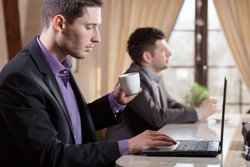 Businessman working in restaurant
