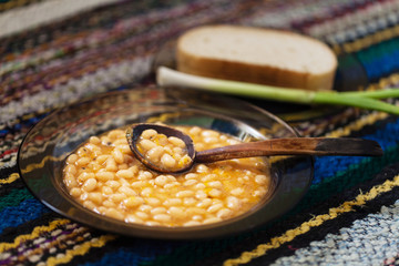 garlic, bread, beans on a colorful rug Bulgarian