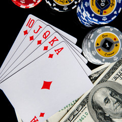 Poker chips Playing cards and dollars