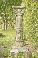Fototapeta na wymiar abstrack decorative roman pillar on the park