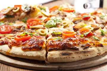 Pizza with ham and mushrooms