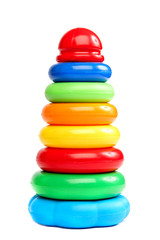 Children's toy pyramid isolated on white background.