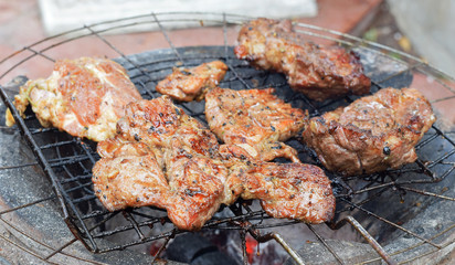 Grilled pork on the grill