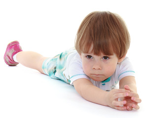 Little boy lying on his stomach.