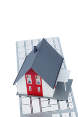 Wohnhaus auf Tastatur