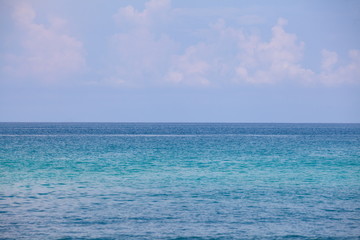 Blue sea water and blue sky background