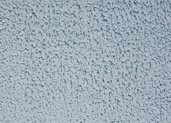 Blue rough plaster on wall closeup