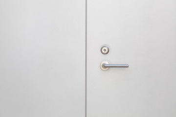 White modern metal door and metal handle