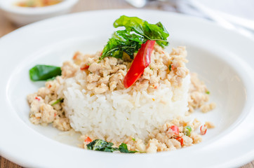 Spicy fried chicken with basil and rice