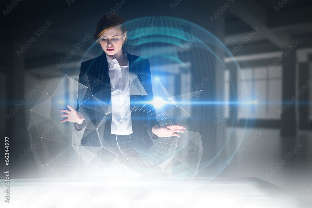 Poster Composite image of redhead businesswoman using interactive desk