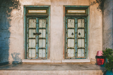 Fototapeta na wymiar traditional old door on home wall, vintage style