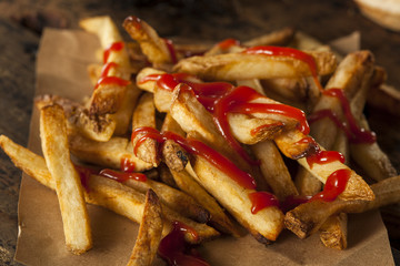 Homemade French Fries Covered in Ketchup