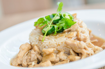 Chicken with brown sauce on rice