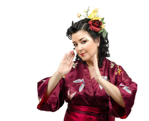 Portrait of emotional kimono woman