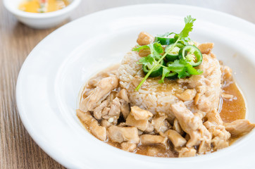 Chicken with brown sauce on rice