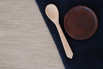 wooden spoon and tablecloth © goldnetz