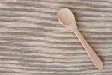 wooden spoon and tablecloth © goldnetz