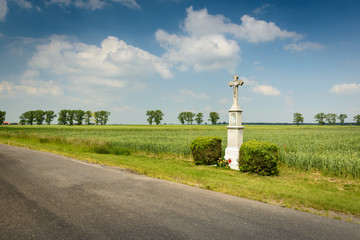 Fototapeta na wymiar Landscape with cross,Poland