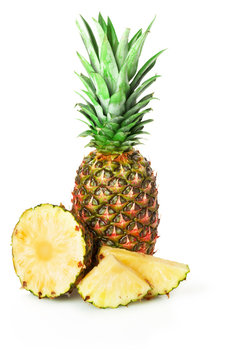 pineapple and  pineapple slices on the white background
