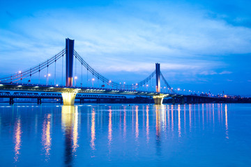 Fototapeta na wymiar Bridge at night, cities and roads