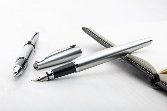 Silver fountain pen and roller pen