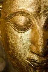 half face of buddha close up