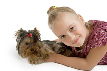 Young girl with puppy, cute Yorkshire terrier - best friends