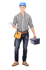 Engineer holding a toolbox and a clipboard