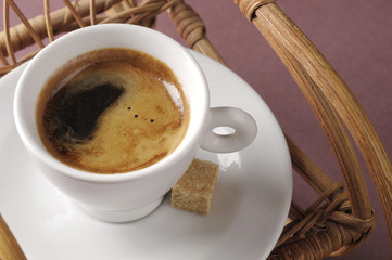 Coffee cup over rocking chair