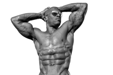 Bodybuilder with perfect abs, shoulders,biceps, triceps,chest