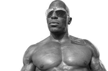 Portrait of bodybuilder wearing eyeglasses with perfect chest