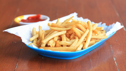 Traditional French fries with ketchup