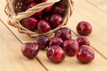 Basket with red ripe cherries