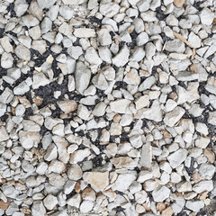 Stone pebbles mixed with asphalt