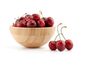 Bowl with ripe red cherries
