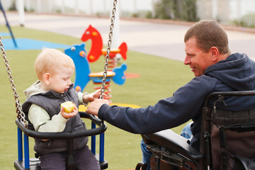 Dad play with child.