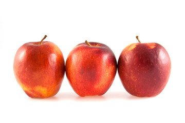 Three red apples