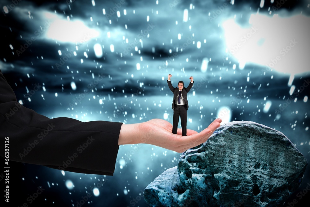 Poster Composite image of businessman cheering at the camera in large h