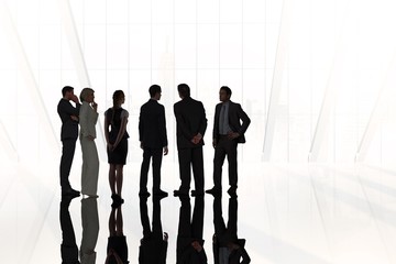 Composite image of business colleagues standing