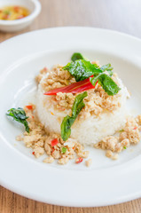 Spicy fried chicken with basil and rice