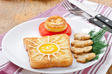 Jolly egg sandwich decorated with mushrooms and tomatoes