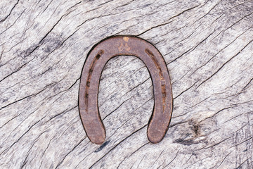 Wooden table top with a horseshoe decor
