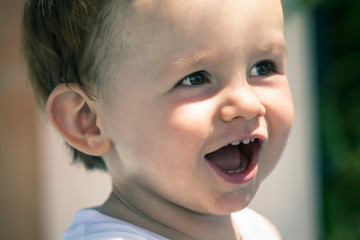 Baby boy laughing