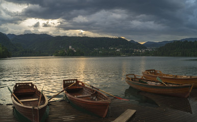 Fototapeta na wymiar Sun and rain over Lake Bled
