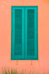 Italian style shutters in an old house