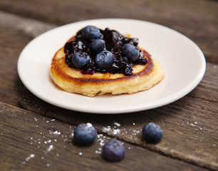 Delicious pancakes with blueberry jam