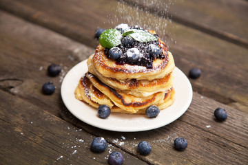 Delicious pancakes with blueberry and mint
